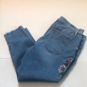LOFT size 20 modern skinny distressed Jeans with floral accent on leg.